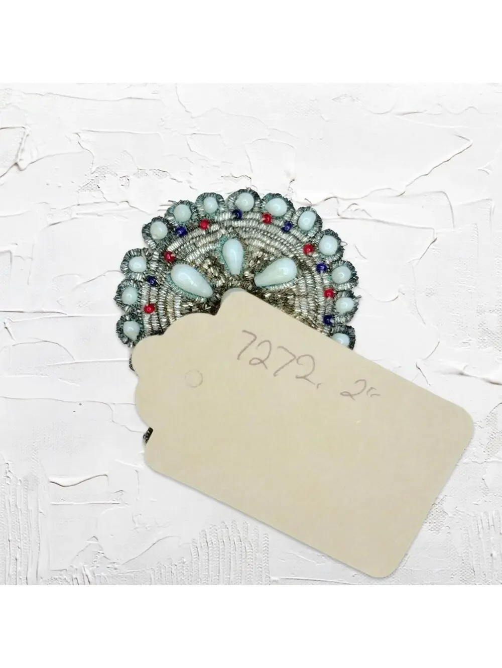 7272. Handmade Beaded Brooch with Blue and Red Accents